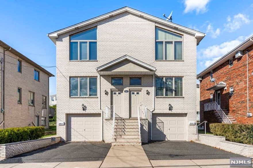 **Newly Renovated 3 Bed 3.5 Bath Duplex in Fort Lee for Rent!! ** Beautifully refinished hardwood floor throughout the entire unit.Main level boasts a spacious living room, formal dining area and a powder room. Modern open kitchen features upscale grey cabinets with quartz countertops, stainless steel appliances with vented hood, breakfast area, and access to the deck. Second floor features the master bedroom with master bath, 2 additional bedrooms, 1 additional full bath with skylight in the hallway. Ground floor is complete with a spacious one car garage with laundry, a recreation room with full bath, and an access to the back yard. Landscaping by the landlord. The tenant is responsible for snow removal. Due upon signing of lease: 1.5 Month security deposit, first month's rent, and one month broker fee.