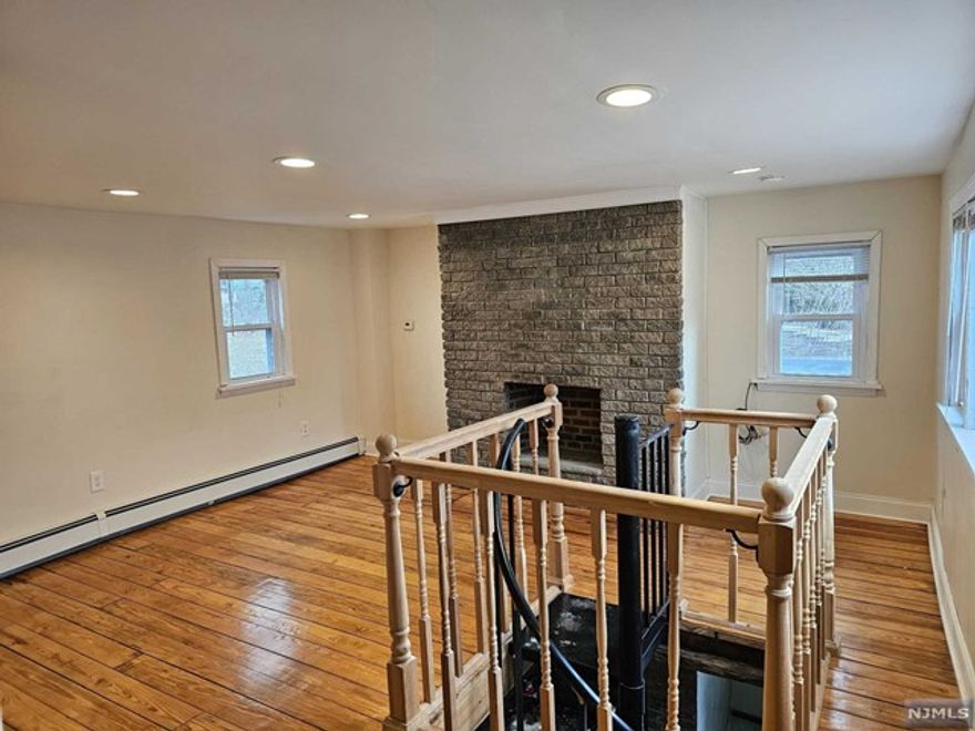 Charming cottage nestled in the center of Pompton Plains. The residence features a kitchen, one bathroom, a living room, a bedroom, a walk-in closet, and an attached garage for one car. Laundry facilities are conveniently included in the garage.