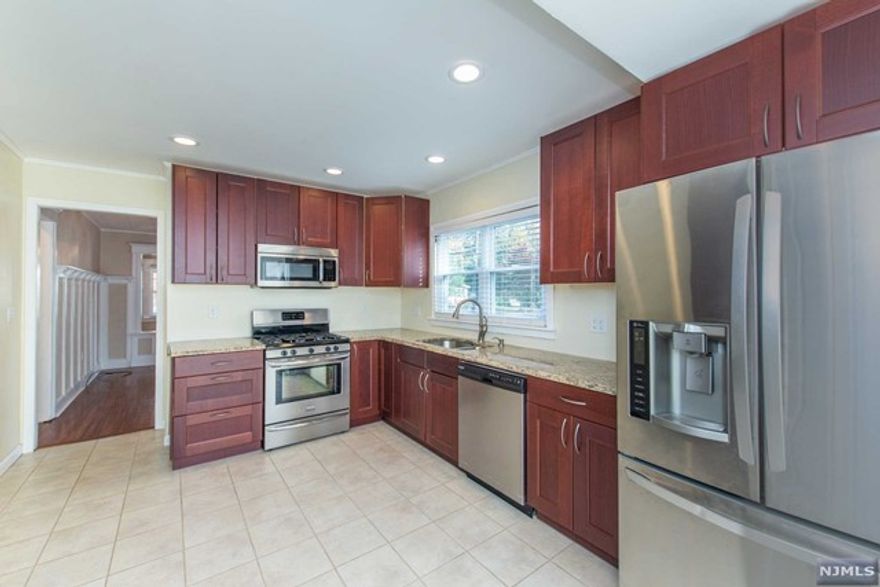 Fully updated 2 bed 1 bath 1st floor unit available immediately for rent on a 2 family home. Large updated eat in kitchen open to dining room. Charming living room and family room. Inviting front porch, use of large backyard. Shared laundry in basement, shared storage in basement. 1 assigned parking spot, additional street parking. Walk to downtown Westwood, convenient location, close to shopping, schools, restaurants, parks and highways. No pets allowed.