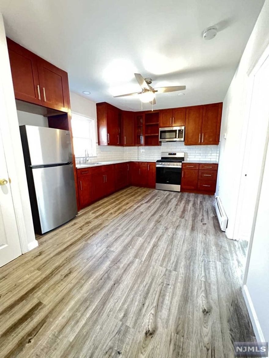 Beautifully remodeled apartment with a gorgeous kitchen! Brand new cabinets, stainless steel appliances, brand new counter tops, new vinyl flooring, and fresh paint. Water and one parking spot included in the rent.