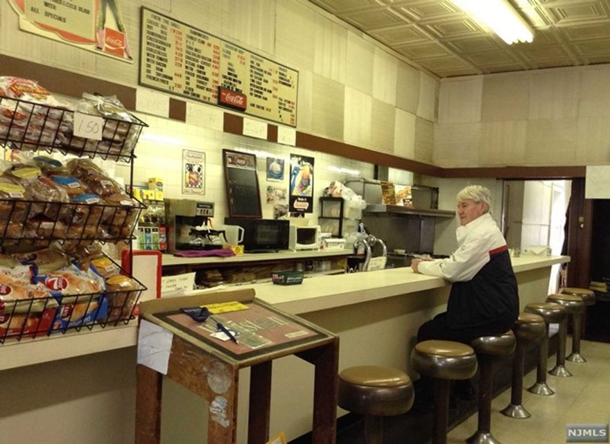 REALLY NICE LOCAL LUNCH, lite DELI, GROCERY BUSINESS WITH Very Good LOTTERY TICKET SALES, 1400 sq. ft. plus full basement included. IN GOOD NEIGHBORHOOD WITH STEADY CUSTOMERS, MUST BE SEEN.