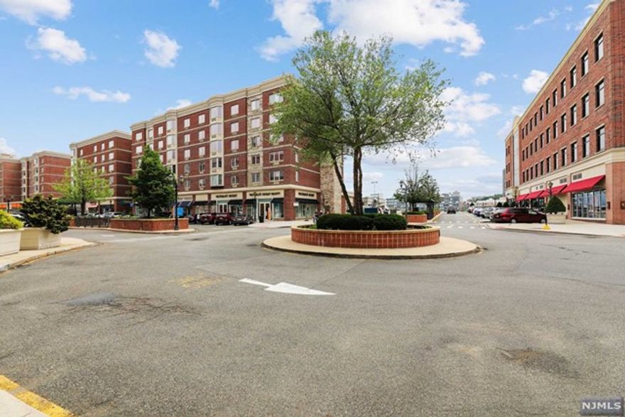 Introducing Residence 1204 at Peninsula in City Place: a spacious one-bedroom condo spanning 836sqft. This unit boasts elegant hardwood flooring and a modern kitchen equipped with stainless steel appliances and granite countertops. Ample closet space and an in-unit washer & dryer enhance convenience. Enjoy premium amenities such as 24-hour concierge service, a fitness center, a children's playroom, and a lounge featuring a wet bar and billiards. Situated in a prime location, a short walk from shopping centers, dining, NYC bus stops, and shuttle services to the ferry, making urban living a breeze.