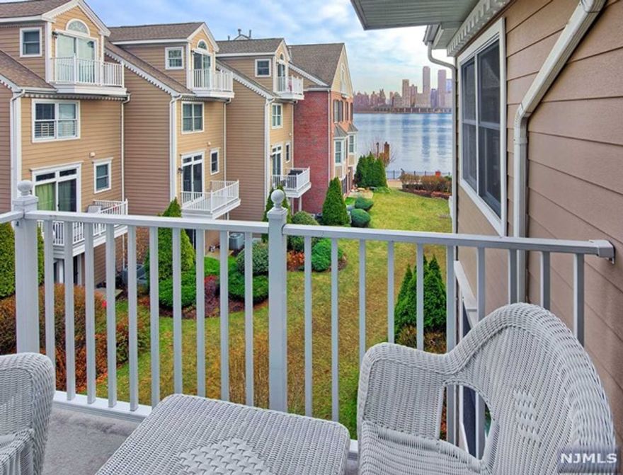 Exceptional Fanwood style home with incredible NYC views!! Hardwood floors through entire home. Antique Gold granite counters, cherry cabinets, custom back splash and stainless steel appliances in gourmet kitchen. Full bath on bottom level. Recessed lighting. Custom window treatments. Parking for two cars; one in private garage and one in driveway. Popular community boasts two pools with jacuzzis, tot lot, waterfront promenade and free shuttle to NY Waterway Ferry. Steps to 158 bus to NYC. Close to restaurants and shopping. NO PETS. A Commuter's Dream Home!!