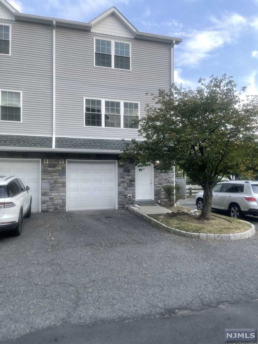 Welcome to a Freshly Painted Beautiful End Unit Townhome in Lodi! Open Concept Kitchen, Living and Dining Room, Half Bath and Deck. Second Floor features the Primary Bedroom, 2nd Bedroom, Full Bath, and Laundry. Ground Floor features a Flex Room, Full Bath, Sliders to the Back Deck and Garage. Floors are Hardwood and Tile! Close to NYC Transportation, Schools, Shopping, Restaurants, Parks and Places of Worship!