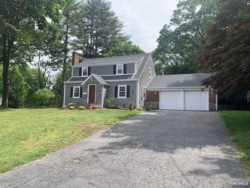 This fully renovated gem sits on a serene tree-lined street, boasting hardwood floors throughout. Enjoy the spacious screened porch overlooking the park-like backyard. It is conveniently located near NYC transportation, parks, and award-winning schools.