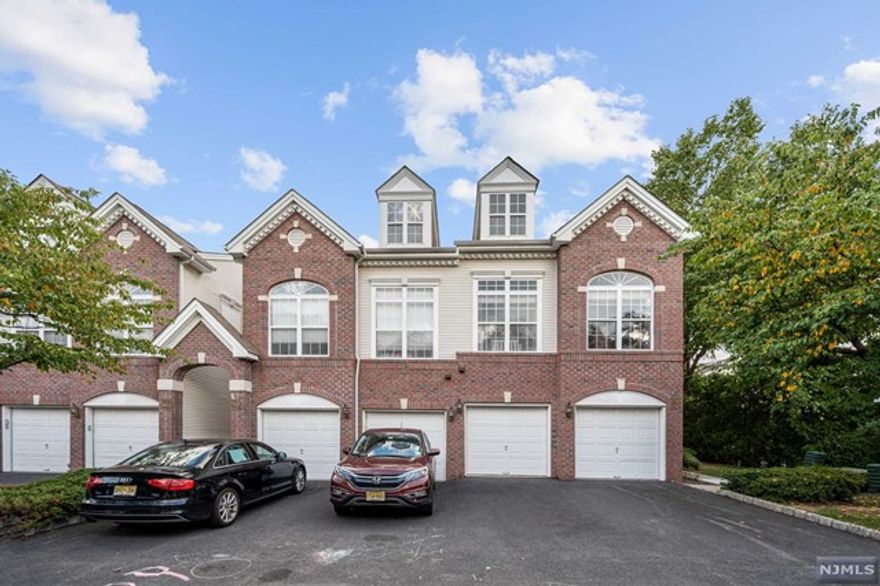 Bright, + Airy 3 Level CORNER Townhome in the desirable Riverwalk Community, with POOL, walking trails, + Tennis Court! Ground Floor entrance foyer w. 2 roomy closets, plus access to your Garage. Head upstairs to your main living level w. hardwood floors, Soaring Ceilings + corner windows allowing in so much natural light! The Living Room features a gas fireplace + is open-concept to your Kitchen + Dining room. Breakfast Bar in the kitchen, corian countertops, SS appliances and lots of cabinet space. 1/2 bathroom for your convenience on this level. Upstairs, find two spacious bedrooms, two full bathrooms, a laundry room, plus a bonus LOFT perfect for TV room or home office. The Primary Suite can fit King Size furniture + boasts a huge Walk-In-Closet +an en-suite primary bathroom with SOAKING TUB, standing shower, + double vanity. Close to all major highways + easy commute to NYC from this location! This unit overlooks the beautiful courtyard + is close to the community amenities!