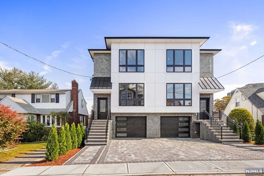 New Construction Townhouse for Rent with Private Rooftop Patio - Live above it all in Cliffside Park! This new modern townhouse encompasses 4 levels of living space, multiple private outdoor spaces, open layout, modern design, attached garage, gas fireplace and more! The ground floor fam room has extra high ceilings. Plenty of storage space, Located near express transportation and all NJ highways! Come take a look!