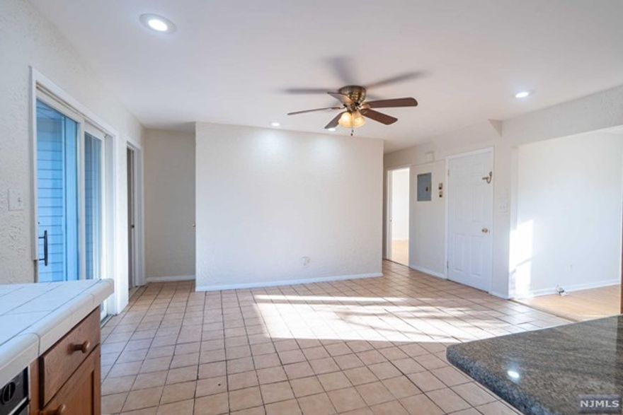 APT Boarding Hasbrouck Heights, 3 bedroom, 2 bath apartment with access to a shared backyard and deck, along with an eat-in kitchen featuring a island, driveway fits up to 3 cars. No pets allowed and tenant is responsible for all utilities, Tenant MUST bring REFRIGERATOR.