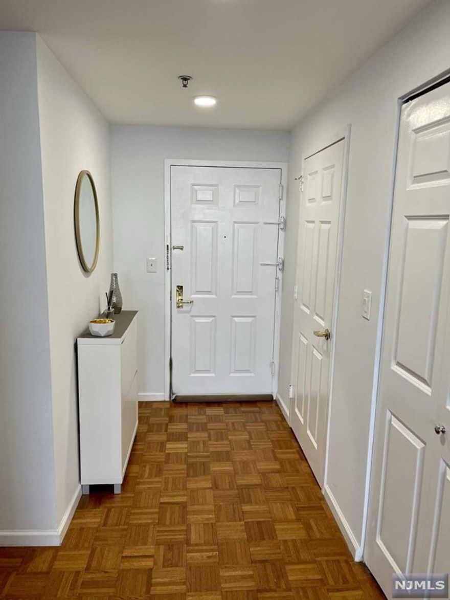 Luxury condominium The Palisades high rise has expansive views overlooking the beautiful town of Fort Lee. Includes 1 indoor parking space. Recent building updates include: garage renovations, hallways, lobby, gym equipment. On site management with full amenities which include an outdoor pool, gym, children's playroom, library, dry cleaners, convenience store/cafe, barbecue area, and area to walk dogs outside. Conveniently located with multiple points of access to NYC. The immediate surrounding area is filled with restaurants, supermarket, cafes, drugstores, and the new shopping complex.