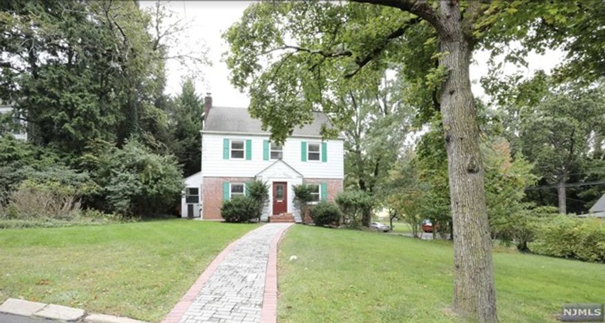 Beautiful Colonial on Tenafly's East Hill. Move-in condition with 4 spacious bedrooms, 2 full baths, and finished basement. Beautifully renovated & updated with Gourmet chef's Kitchen with stainless appliance, Viking 6-burner range, Sub-Zero fridge, Bosch dishwasher, granite countertops and grand island. Hardwood Floors throughout and Mud Room leading to backyard deck & BBQ area. Laundry conveniently located on the second floor. Central Air and attached one car garage. New paver walkway and newer driveway. Great location.... minutes from everything- schools, parks, easy commute to NYC, and lovely downtown Tenafly. No pets. Tenant responsible for landscaping and snow removal.