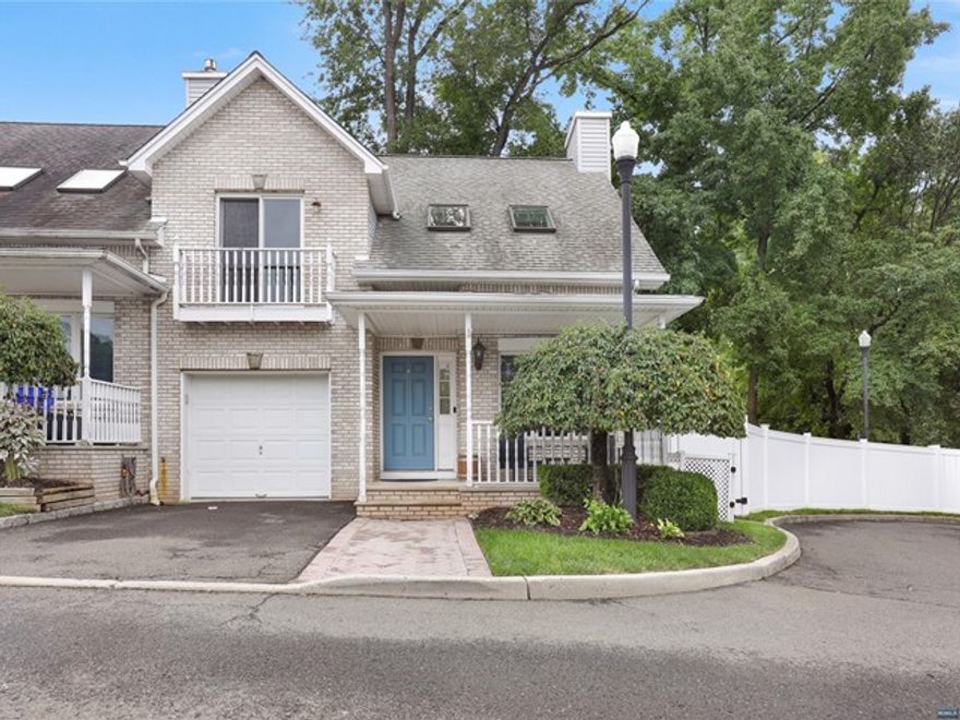 This end unit two bedroom, 2.5 bath townhome is located close to everything in Saddle Brook. Gleaming hardwood floors great you when you enter the living room with gas fireplace and dining room with sliders to patio and side yard area. The kitchen has a pantry and second set of sliders to patio area. Entrance to attached garage. Powder room rounds out the first floor. Upstairs is large primary bedroom with closets and large bath with jetted tub. The second bedroom has small deck overlooking the front of complex. Full Bath, Laundry on second floor. The spacious basement has high ceilings and is just waiting for you to finish and add living space. One car garage and great front porch to greet you. Low HOA and convenince to major transportation, shopping and schools, you do not want to miss out on this one!