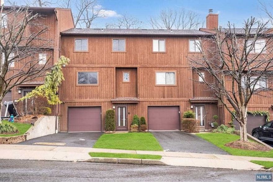 Beautifully renovated spacious townhome with great views! Renovated kitchen with granite, wine fridge, SS appliances. Open floor plan, Updated baths, First fl has bedroom and bath, All cert/inspec resp of buyer. Being sold "as is"