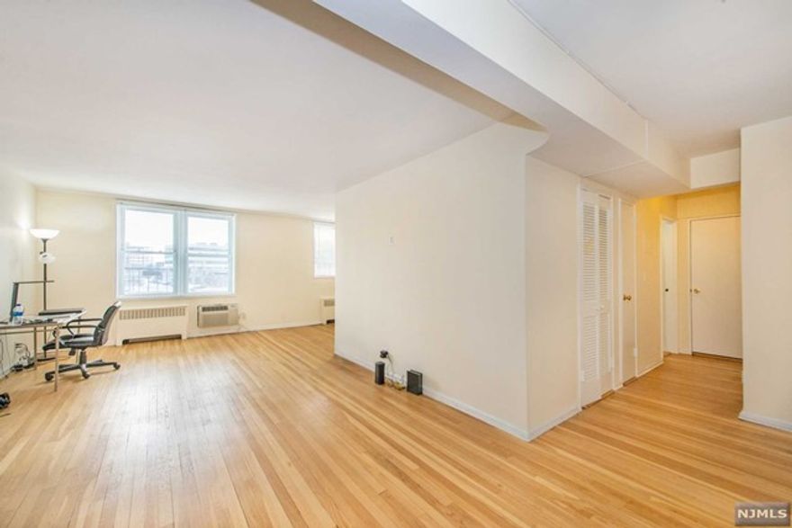 Investor only! Must see this bright and spacious large one bedroom apartment (828 SQFT) in the heart of Fort Lee, this apartment showcases entry foyer, sizeable living room, dining room, modern kitchen with newer refrigerator, good size bedroom and full bathroom, all large windows. Hardwood floor throughout. Laundry onsite. Low maintenance includes: cooking gas, heat, hot & cold water, common areas etc. One Parking spot and one-car garage***very easy commute to NYC***