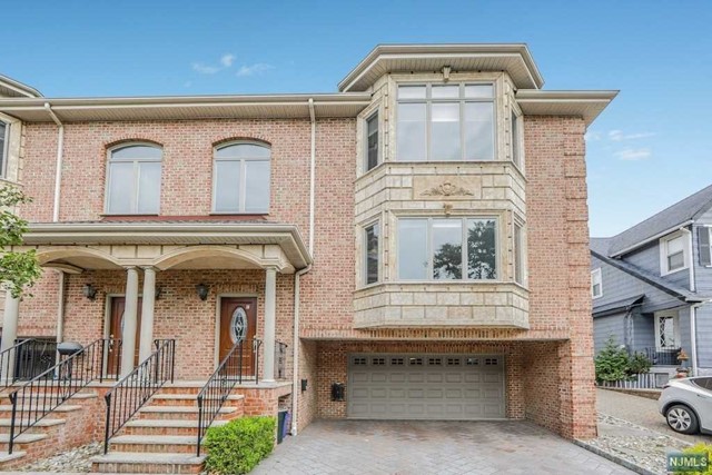 BEAUTIFUL BRICK TRIPLEX IN PRIME LOCATION. VERY BRIGHT SOUTH FACING. OPEN LAYOUT, ALL HARDWOOD FLOOR THROUGHOUT, FIREPLACE, CENTRAL A/C, MULTIPLE HEATING ZONES, WASHER/DRYER IN UNIT, 2 GARAGE WITH 2 OUTSIDE PARKING, GROUND FLOOR HAS LARGE STUDIO WITH SEPARATED ENTRANCE. CONVENIENTLY CLOSE TO SHOPS, SCHOOLS, MAJOR HIGHWAYS, AND NY EXPRESS BUS. A SMALL DOG MAY BE CONSIDERED.