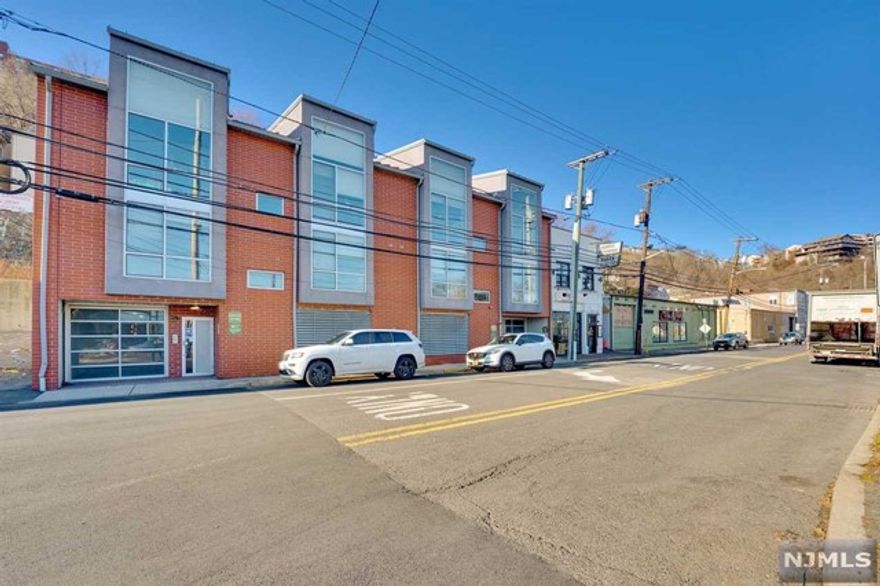 Stunning 2bd/2bth Duplex condo w/ bonus large loft space. Modern open floor plan with the lvgroom, kitchen,beautiful appliances a wine cooler, dining room on the main level w/a nice flexible flow. Livingroom and loft windows face east for beautiful views & tremendous natural light. There is a generously sized bedroom and bathroom completing this level. Second floor has 2 amazing & much needed storage areas & a washer/dryer. The spacious primary bdrm/bthrm is charming w/a lovely Juliet balcony facing the back of the house providing invaluable privacy. The very large loft space can serve as a private living space to complete the primary bdrm. The location is truly a commuters dream being literally 15 minutes from NYC & a NY bus at your doorstep. Close to Shopping, movies, wonderful restaurant options and steps from the most magnificent view of the NY skyline in the world! Making this a perfect choice! 1 indoor garage Assessment for new elevator anticipated amount of $45,000