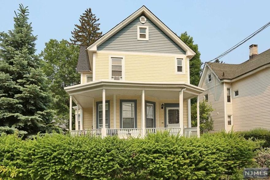 Meticulously cared for updated 2nd floor apartment that includes a large living room w/ parquet floors, eat-in-kitchen w/ ss appliances and granite counters, 2 generous size bedrooms with plenty of closets space, full bath and laundry in unit . Huge walk up attic with tons and tons of storage. Parking for 2 cars in back. Main Street is steps from commuter train to NYC, shopping, restaurants, schools and major highways.