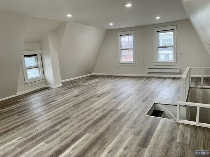 Located in the heart of Nutley's downtown shopping district. This apartment features 3 bedrooms, formal living and dining room, a huge 540sf finished attack loft for additional living space and a large basement for storage and private driveway. Conveniently located near public transportation. Walk outside your door and you are surrounded with downtown eateries, shopping and entertainment!!