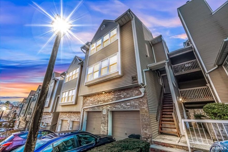 Totally renovated and bright Windsor Square unit. Open Floor Plan-Large Cathedral Ceiling LR w woodburning fire place. DR/Family Rm. Brand new kitchen with top of line appliances. Renovated bathroom and dining area. W/D located by Bedrooms on 2nd floor. Hardwood floorings, extra recessed lighting throughout. Indoor garage and 2 parking spaces out. Unique unit.