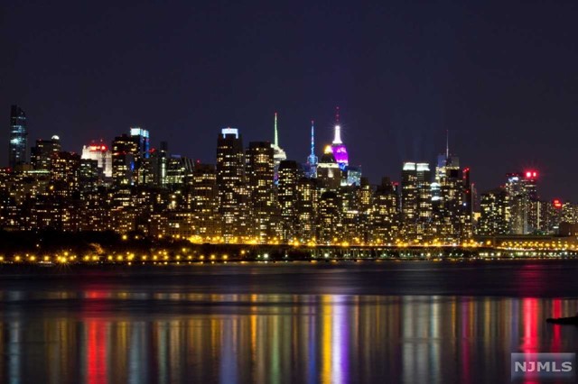 Waterfront Premiere Penthouse With Panoramic NYC Views!!! The Pearl a boutique loft style luxury midrise featuring 12'ft floor to ceiling windows, high-end finishes including Bosch appliances with built-in coffee maker, Caesarstone countertops, Italian Porcelain Baths, Hardwood Floors, automated security, lighting & climate control. This 2,741 sf home features 3 Beds, 3.5 Baths with private balcony which can easily be converted into 4 Beds & 2 Car Garage. Situated in the heart of Edgewater Harbor, a premier waterfront community with shopping, restaurants, a dog park and private pier. The Pearl is a personal sanctuary with numerous private spaces including a spectacular roof deck featuring unobstructed NYC-Hudson River Views, private pool and cabana area, clubrooms, library, private shuttle service to NY Waterway Ferry and 24 Hr Concierge. The Pearl was designed for THE WAY WE LIVE TODAY!