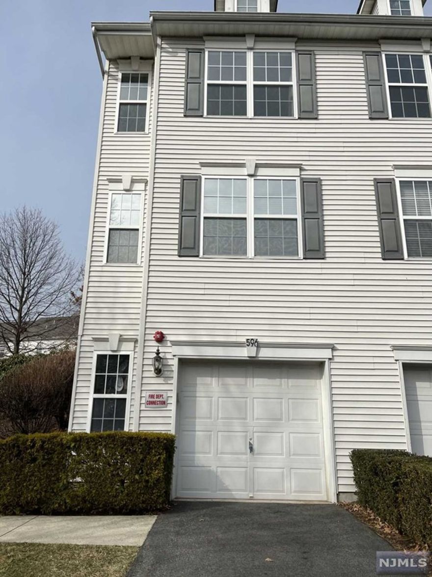 Beautiful home in a highly desirable gated community.The NYC bus stop is at your doorstep and the NJ Transit trains 2 minutes drive (bus also available to trains).It is only 10 miles to NYC!Close proximity to many stores and restaurants. Community amenities include outdoor swimming pool, tennis courts, upgraded gym and playground. Sun drenched rooms with East/West exposure End unit with extra windows Open floor plan, Recessed lighting, Vaulted ceilings, Huge loft that can be used as flex space, Office nooks for remote working Features one of the largest kitchens with an eat-in kitchen.Ample common area green space (lawn) for entertaining, kids and/or pets. One car garage with plenty of additional parking Features in the home:Upgraded hardwood floors throughout Porcelain kitchen tiles & new kitchen light fixture. All stainless-steel appliances in the kitchen Upgraded master bathroom and updated main bathroom.