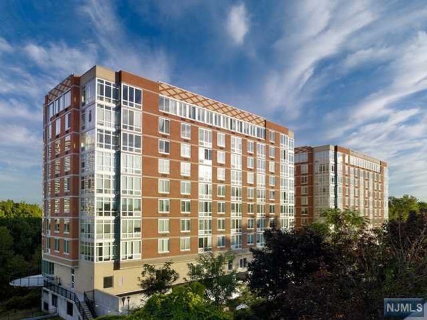 LUXURY MODERN CONDO IN VERY COVENIENT LOCATION. 2 COVERED PARKING SPACES AND ALL UTILITIES ARE INCLUDED EXCEPT ELECTRICITY. 10FT HIGH CEILING WITH FLOOR TO CEILING GLASS WINDOW. ALL HARDWOOD FLOOR THROUGHOUT, GRANITE COUNTER TOPS, SS APPLIANCES, WASHER/DRYER IN UNIT. AMENITIES ARE COMMUNITY LOUNGE, FITNESS CENTER, CHILDREN'S PLAYROOM, BUSINESS CENTER, GAME ROOM, SIMULATED GOLF, YOGA STUDIO. EASY COMMUTE TO NYC. A SMALL DOG MAY BE CONSIDERED.