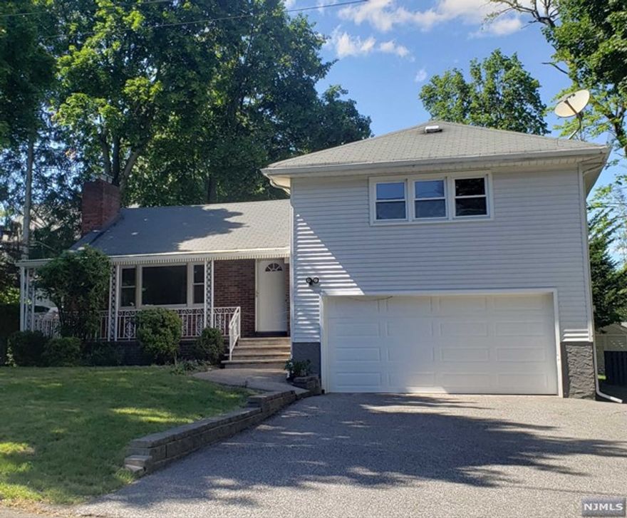 Spacious S/L on a quiet street. Large living room with cathedral ceilings; bright bedrooms offer generous size. Hardwood floor throughout. Many recent year updates inclu. kitchen & bathroom etc. 2 car garage and a very big driveway. Backyard private fenced in. Blue ribbon schools. Owner has NJ Lic.