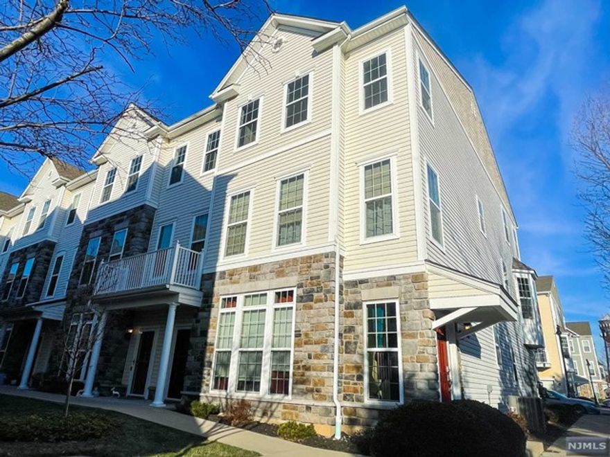 Live in style in this beautifully-maintained townhouse. Park comfortably in the ample one car-garage then walk up to the second floor where you'll find a powder room, open concept kitchen, dining room/living room, with lots of natural lights throughout the large windows facing west and south, laundry room, and utility room. Go upstairs to the third floor where you'll be greeted by a hallway that leads to large master bedroom with jacuzzi, standup shower, closet and large vanity and mirror, 2 walk in closets, second bedroom with walk-in closet, full bathroom, den that can be used as TV room or even a 3rd bedroom. Enjoy living the comfortable and desirable amenities such as club house, pool, and courtyard. This community is tucked away in quiet part of Garfield bordering Elmwood Park, Lodi, and Clifton near major transportation arteries such as routes 46, 4, 17, 80, near houses of worship, schools, restaurants, a short drive to Westfield Garden State Plaza in Paramus.