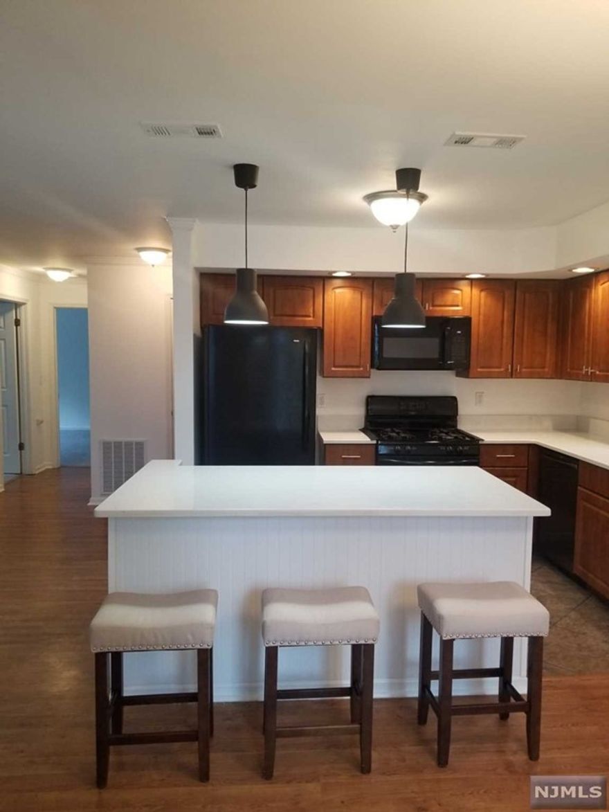 Lovely end unit in the gated community of Cambridge Heights. Open concept kitchen with quartz island seating for 3 and separate dining area. Living room with fireplace and French doors to deck. Primary bedroom with full bath and walk in closet, additional bedroom and full bath. Laundry closet in unit. Also included is a detached garage with additional covered parking for guests. Pool, tennis, club house exercise room and close to major highways. There are steps to get to the nit but once inside, its one floor living. No pets allowed, credit check and first $150 of each repair is the responsibility of tenant.