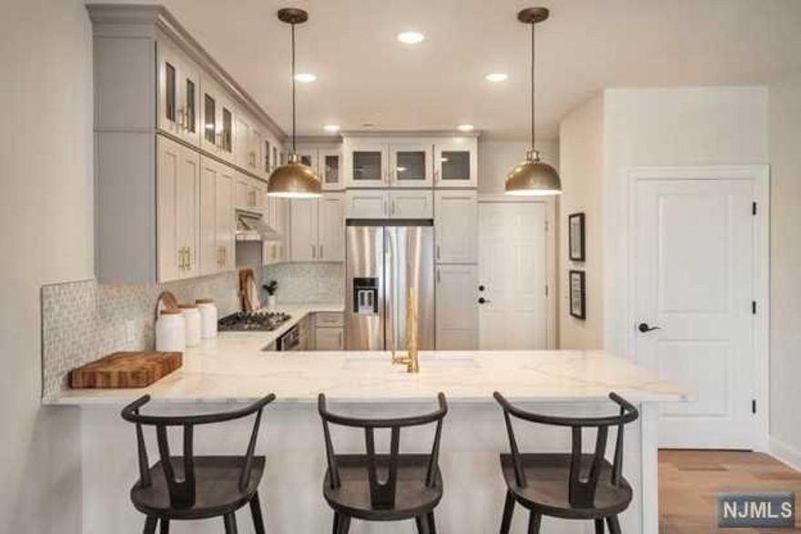 New Constriction Model For Sale! Buyer(s) will receive a 5 year tax abatement. Over $18,000 in savings on new construction only! This model home offers 2 bedrooms and 3 full bathrooms, private garage and lots of flexibility to fit your lifestyle. Rare opportunity to move into the desirable Link at Wesmont community. Top Bergen County school district. Close to major highways, shops, and restaurants. A private trail in the community connects you to the train station that is only a five-minute walk to the train station and just five stops to NYC! Don't miss this rare opportunity to own a professionally decorated model home.