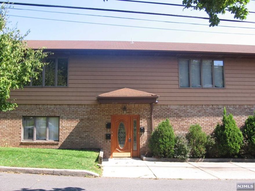 NO STAIRS !!!!!! WALK RIGHT IN TO THIS 1ST FLOOR LARGE & BRIGHT 2 BEDROOM APT !! ALL UPDATED AND ALL LARGE ROOMS, GORGEOUS GRANITE AND SS KITCHEN, BEAUTIFUL HARDWOOD FLOORS !! CENTRAL AC, HOUSE IS ON QUIET ONE WAY STREET. ONLY ONE BLOCK TO NYC TRANS.All New Paint, Professionally Cleaned & Ready ! Realtor Lease Application, and National Tenant Network (NTN) Scoring Report with MultiState Criminal Search & OFAC report is required. Subject to financials and interview. Security deposit, 1st month's rent and Broker's Fee by Bank Check or Money Order only.