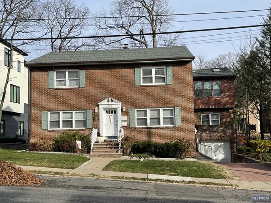 Tastefully renovated 1st floor of 2family house.Bright and spacious unit in a desirable location. Rare opportunity to live in a beautiful brand new interior. LG 1car garage and full basement. Use of byd. close to elementary school, NY bus and park. Pleasant to show.Owner has a NJ Realestate License.