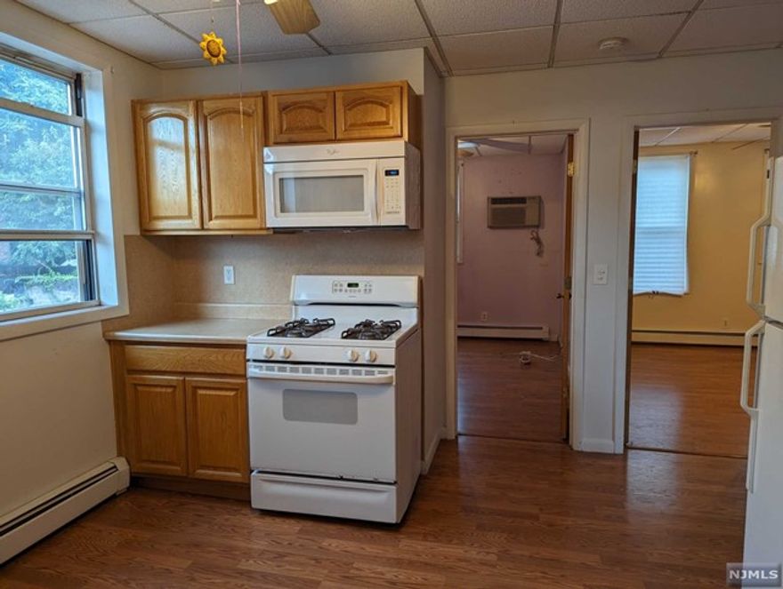 Huge two bedroom one bath apartment. Landlord pays for heat. Tenant pays for electricity and cooking gas and water. Parking included. New Floors Throughout Apartment. First Come, First Serve. Credit check and Income requirement. 1.5 Month Security Due at Signing. Come see it for yourself!