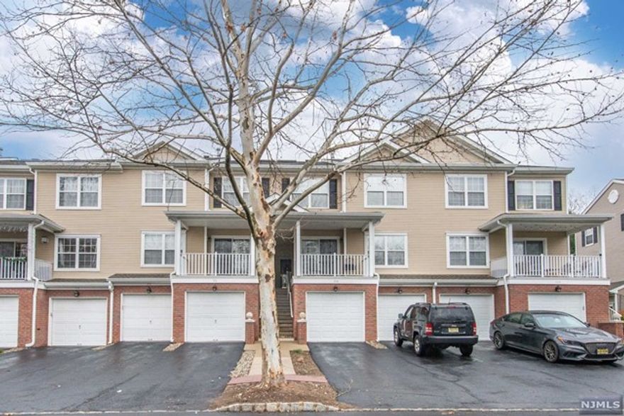 YOUR SEARCH ENDS HERE!!! Welcome home to 98 Carter Rd. This well- maintained 2 bedroom, 2.5 bath townhome in Sony Ridge in Haskell sits on a quiet and cozy street. Truly "move-in" ready. Walk through the foyer that leads to a gracious open floor plan that boasts natural sunlight, hardwood floors, and recessed lighting. The foyer leads to a formal living/dining room, kitchen with brand new stainless steel appliances. Large windows overlook the private patio. Master en-suite includes walk-in closet, vaulted ceiling, en suite bath with large closet and tub. Laundry conveniently off the kitchen. Finished basement and access to the attached 1 car garage and 2 exclusive parking spot in driveway. Minutes from restaurants, schools, and all major highways THIS IS A MUST SEE!!