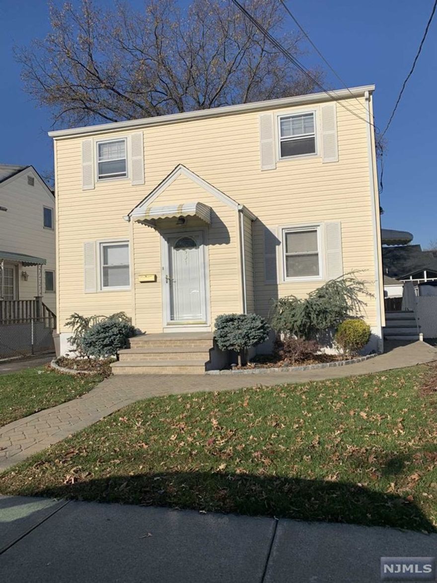 Renovated 2 Bedroom, 1 Bathroom apartment in a two-family home. 2nd Floor apartment features separate entrance, 2 good sized bedrooms, 1 modern bathroom, modern kitchen with marble countertops and stainless steel appliances including gas stove/oven, microwave, and refrigerator. Laundry in basement. Street parking. Tenants pay their utilities and one month realtor fee. Great location, very convenient to public transportation, shopping, schools, and parks.