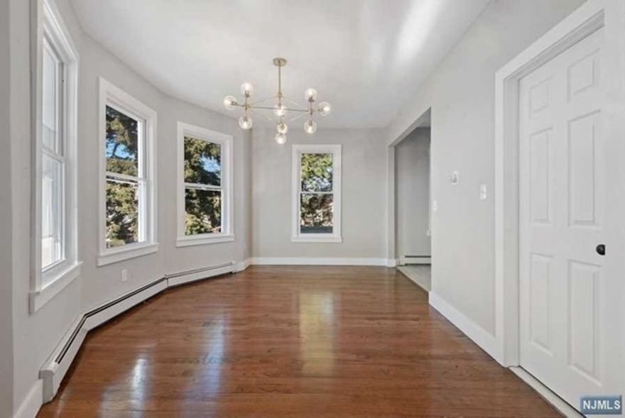 Welcome home to this bright & spacious renovated 3 bedroom/1 bath apartment. Kitchen features stainless steel appliances & granite countertop. Hardwood floors throughout. Utilities included. Access to shared washer/dryer & large backyard. Great location - close to transportation to NYC shopping, schools, places of worship & James Braddock Park.