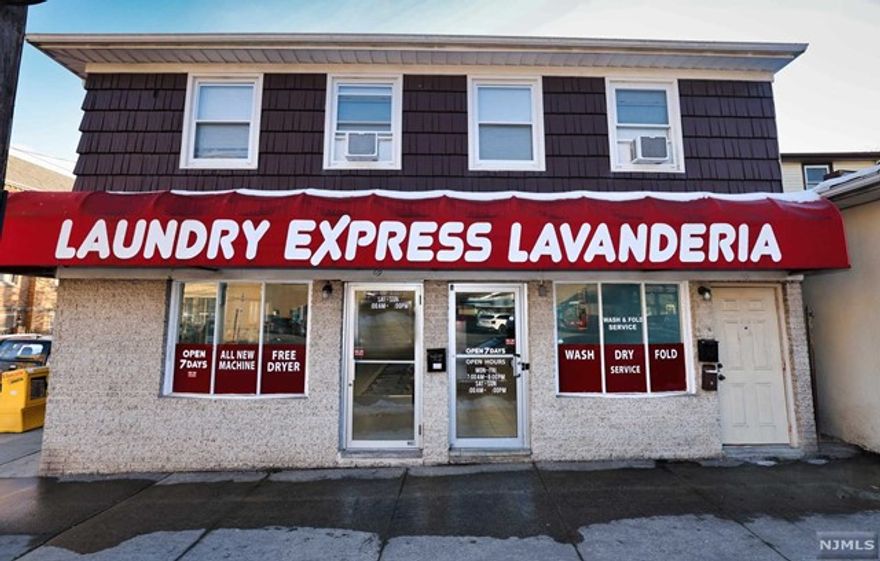 Mixed Use investment opportunity next to Silver Lake Station in Belleville. Convenient to shopping, restaurants, schools, houses of worship. Two residential units on the second floor, (1) One bedroom, and (1) two bedroom unit. Three off street parking spaces. First floor was a laundromat for 35 years, the machines are gone and the unit is vacant, but the infrastructure remains. Also on the first floor is an office, kitchenette, full bath and half bath. First floor could be divided into two commercial units, as it was prior to the laundromat tenant. Photos of apartments were taken when vacant.