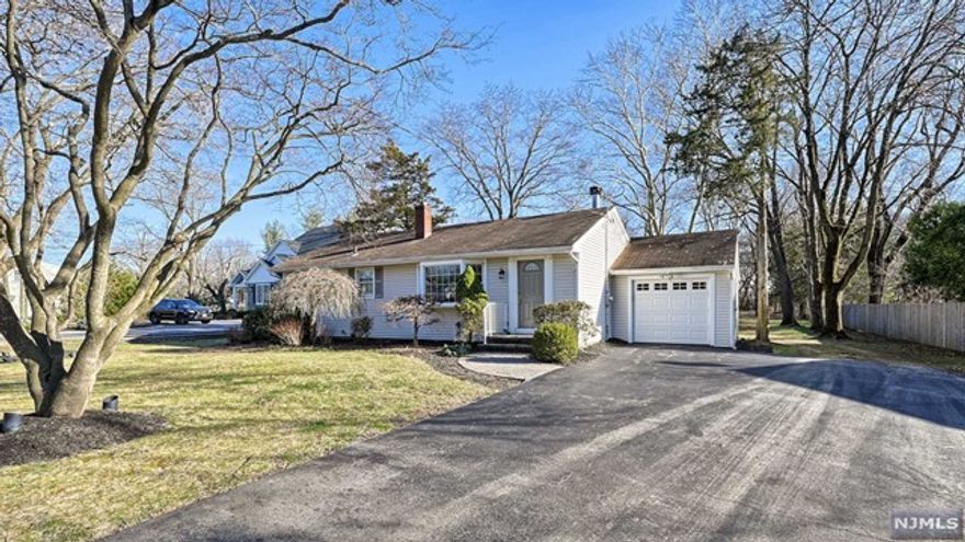 Renovated Ranch located minutes from Rt 23 on Mountain Ave in quiet Pompton Plains. One floor living with open floor plan and gas fireplace featuring a massive, flat backyard, attached garage and double wide driveway. This single-family home has it all! Located in a non-flood neighborhood and within the desirable Pequannock school system!