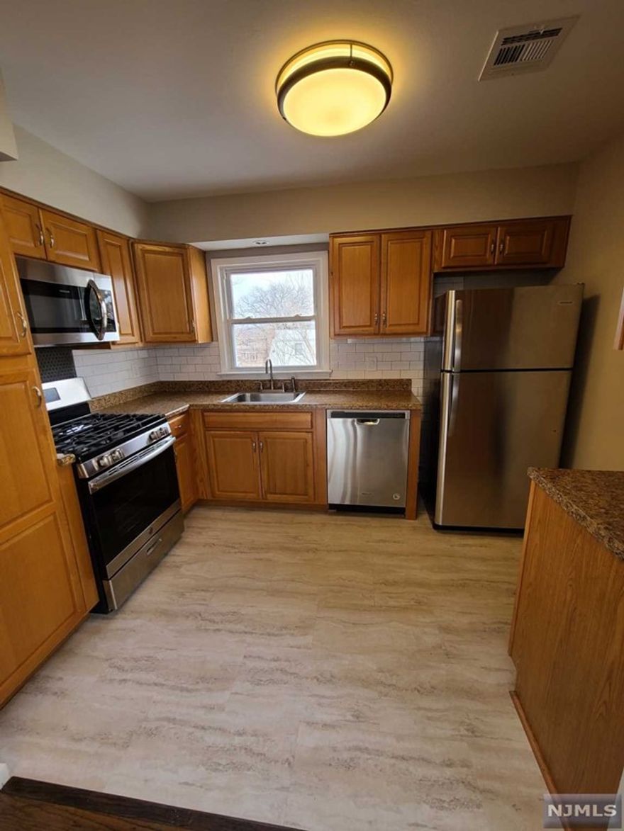 Beautiful three (3) bedroom apartment with view of the New York Skyline. This stunning unit features gleaming hardwood flooring, central air, laundry in unit. Refrigerator & washer/dryer included. First month rent, 1.5 months security and 1 month brokerage fee. National Tenant Network full report, current paystubs, and interview required Tenant insurance required and copy of policy to be given to landlord. Pets are conditional and some with additional security in this smoke free environment. Whether you are moving from NY, work in NY or just like this easy commute to NY this could be the apartment for you. Lyndhurst offers both bus & rail transportation to NY plus free commuter parking appropriately located on New York Avenue.