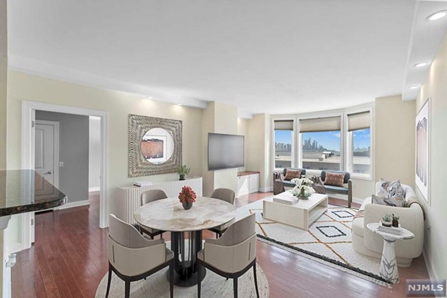 Expansive views, the convenience to shops and close proximity to the Manhattan, this pet-friendly unit checks off lots of boxes. The unit has Manhattan views from every room, south facing balcony and multiple covered parking spots. Come see this bright, sunny, south-facing unit located minutes from Manhattan.