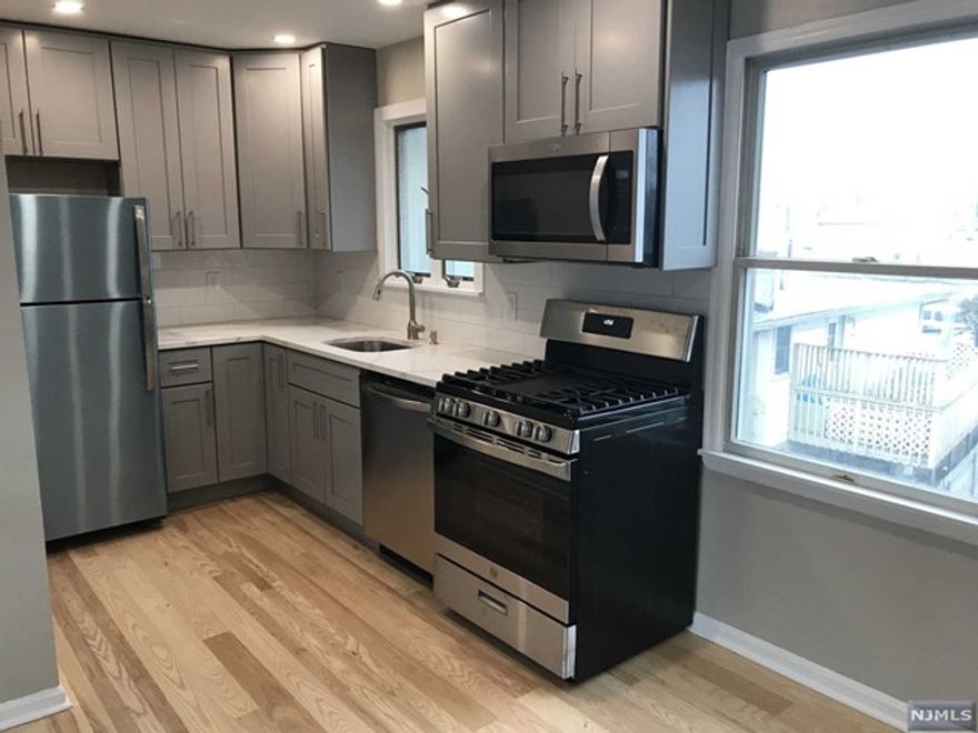 completely renovated one bedroom apartment on third floor. One off street parking space provided.No pets allowed