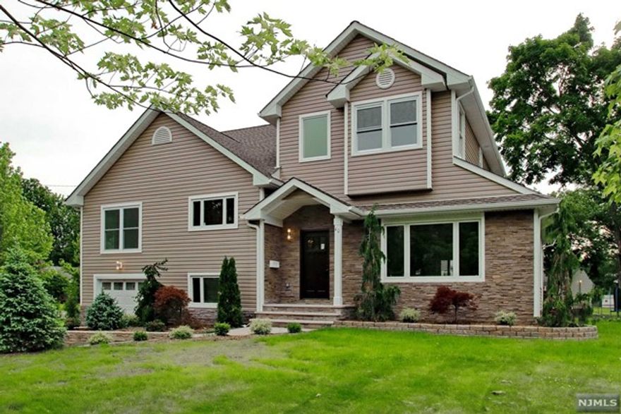 FOR RENT: SPACIOUS AND NEWLY RENOVATED TO THE HIGHEST STANDARDS IN DESIRABLE GLEN ROCK. MASSIVE 3,550 SQ FT CONTEMPORARY WITH LOADS OF LIVING SPACE ON OVERSIZE CORNER LOT. 2 STORY ENTRY FOYER LEADS TO SPACIOUS OPEN CONCEPT LIVING SPACE WITH PICTURE WINDOW, ELECTRIC FIREPLACE AND DECORATIVE NICHES, FORMAL DINING ROOM AND STUNNING MEIK WITH HIGH END STAINLESS STEEL APPLIANCES BY WHIRLPOOL, QUARTZ COUNTERS AND CRISP, CONTEMPORARY STYLE.10' CEILINGS. 6 LARGE BDRMS SPREAD OVER 3 LEVELS,ENORMOUS MASTER WITH SPA-LIKE ENSUITE BATH FEATURING DOUBLE VANITIES. FULL FINISHED BASEMENT WITH STORAGE, UTILITIES, OPEN REC SPACE WITH MOSAIC DETAILS AND WALK-OUT ACCESS. HIGHEST QUALITY FINISHES, TOP QUALITY HARDWOOD. STUNNING MODERN HOME IN A GREAT TOWN NEAR TOP SCHOOLS AND NYC TRAIN. TENANT RESPONS FOR LAWN CARE AND SNOW REMOVAL.