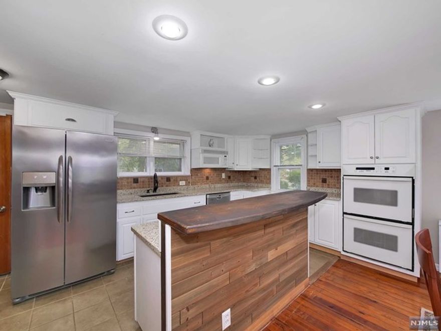 newly updated 3 bedroom home in very quite & beautiful neighborhood. Huge yard, close to NYC buss