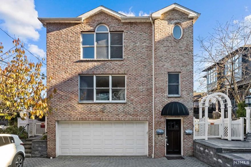 Spacious 3 Bedroom 2 Bath rental on Quiet Cul-de-sac is walking distance to NYC transportation and Palisades Interstate Park. Large Living room, Dining room and Eat in Kitchen. This apartment has newly refinished hardwood floors, New appliances, Central Air conditioning, laundry and rear Deck with access to patio and Hudson River Views. Large Primary Bedroom with Primary Bath. This home is also equipped with Full House back up generators, Apartment comes with 1 garage space and one driveway space included. Tenant responsible for snow removal.