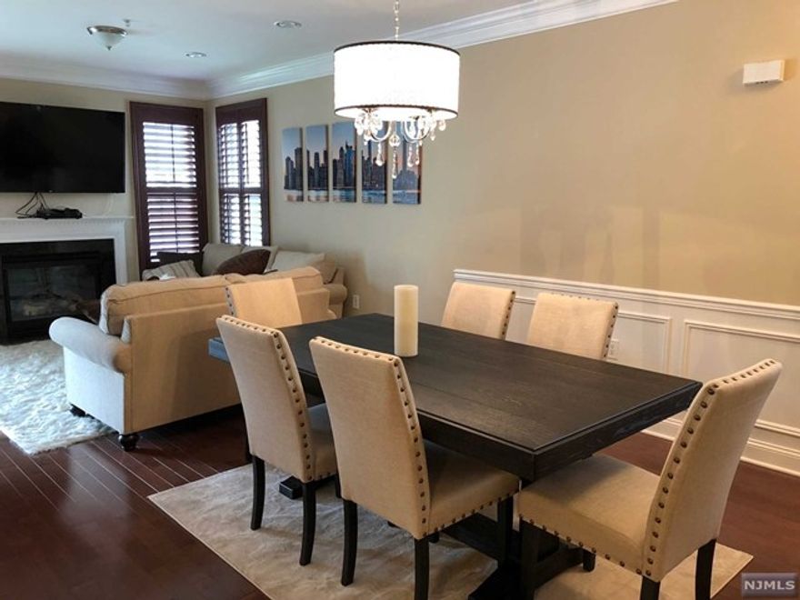 Outstanding townhouse end unit, in a very desirable complex. Offers a Gorgeous layout and Eat-in-Kitchen with Stainless steel appliances, Granite counters and deck overlooks yard. Living room with fireplace, Master Bedroom with jetted tub and separate stall shower and opens to a deck. Finished Basement. Close to Public Transportation, school, Parks, and shopping.