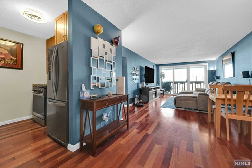 Highly desired A unit in a luxury building with 24 hour Doorman. Great care in taste & design was taken in "Top Of The Line" upgrades such as Brazilian Cherry Wood Floors, California Closets, Renovated Kitchen & Bathroom. Electric Blinds throughout. Enjoy the Country Club feeling at the pool area. And Pickle Ball/ Tennis also