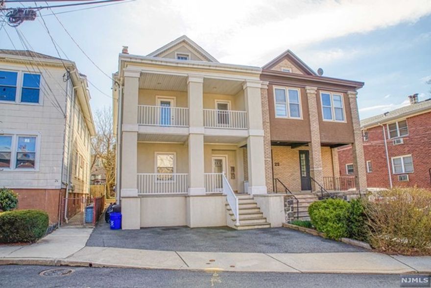 Completely renovated 2 BR apartment located on quiet street. LR with gas fireplace. Gourmet kitchen features top of the line stainless appliances and peninsula with seating. Relax on the adjacent balcony after a long day at work. Laundry room with Washer/Dryer. Walk to NYC Bus transportation. Lots of light! One parking space included. Tenant responsible for snow removal.