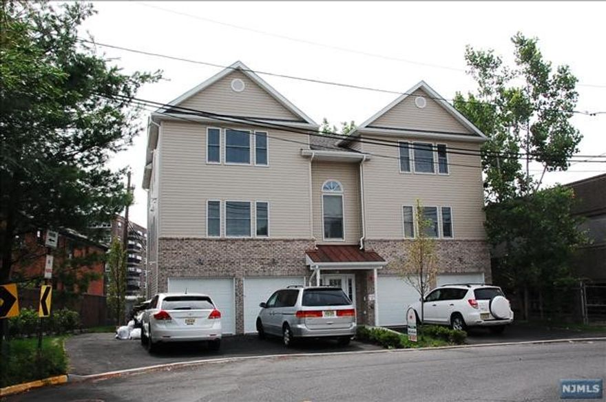 Fairly New Apartment located close to shops,school & nyc buses. near all hwys & gwb. w/d in unit. one i/d & o/d parking spcs. Hardwood floor. Must see.