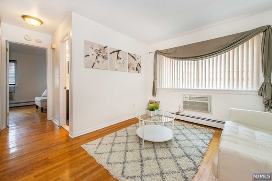 1 Bed/1bath condo located on the Nutley border, in the most desirable area of Belleville. Kitchen boast new appliance and plenty of storage. Living room/dining room combo features hardwood floors that continue into the bedroom. Unit was completely updated in 2015. The bedroom has an oversized closet and there are 2 wall unit ACs in the unit. Heat and hot water included in HOA. Coin Laundry on site. 1 assigned parking spot and this unit is located close to public transportation.