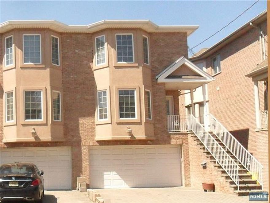 Enjoy relaxed living in one of the best locations. Spacious entrance foyer leading into a cozy living room, hardwood floor throughout and dining room. The kitchen is complete with granite countertops, stainless steel appliances and a sliding glass door to private deck. On the second floor, the master bedroom has a full master bathroom that contains a separate shower stall and tub.This great duplex is located only steps away from shopping, NYC transportation and major highways.