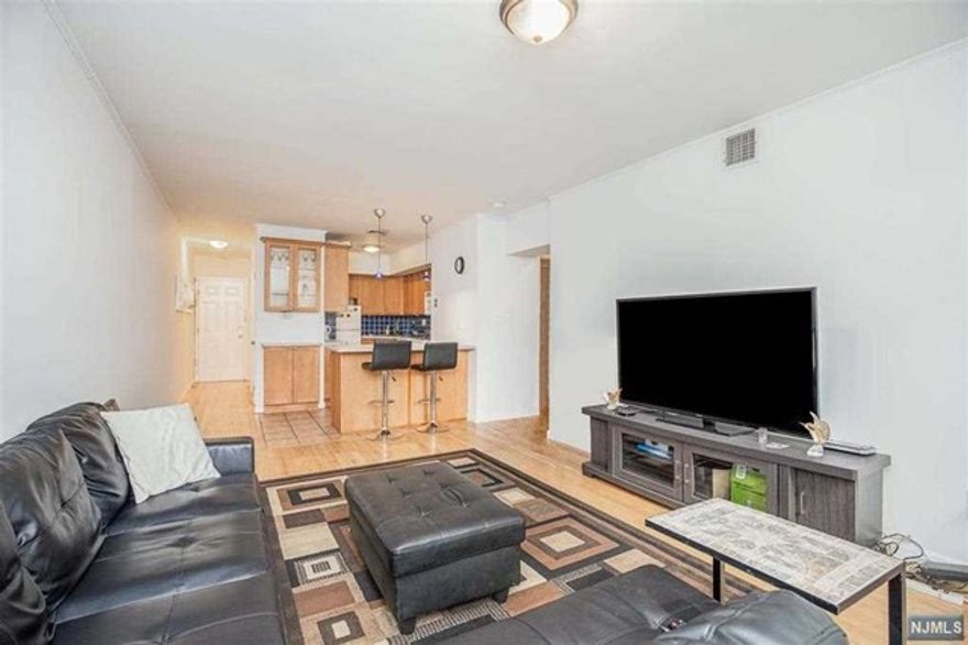 Prime Location! Desirable Blvd East. Rarely becomes available. Modern spacious two-bedroom, one bath Condo in beautiful well maintained Rivergate Building. Conveniently located on the 2nd floor, features Central AC & Heat and hardwood floors throughout, Galley kitchen with breakfast bar, lots of cabinets and spacious living room. Two large bedrooms with ample closet space, bathroom with linen closet and double vanity. Laundry on-site, security cameras, common outdoor space and secure storage area. Low taxes and maintenance. Perfect for first-time buyers or investors. Lease in place until March 2023 but can be also delivered vacant. Commuter's Dream with Bus stop to NYC right outside the door and mass transit to Hoboken, Light Rail and NY Waterway Ferries! Promenade provides recreational choices such as basketball, tennis, children's playground, dog park and skateboard park.... Shops, groceries, multicultural restaurants all close by.